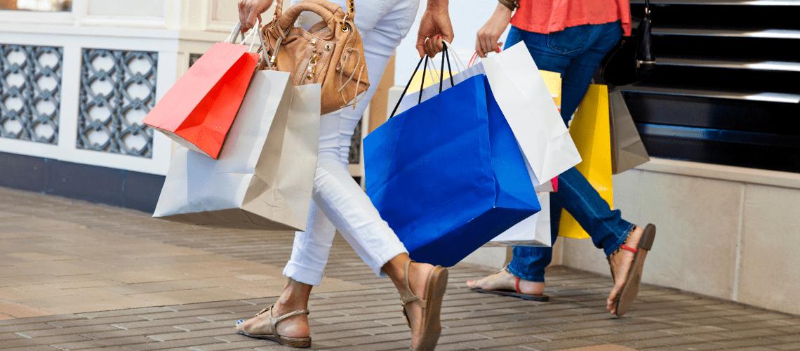 Image of two women walking and shopping for a post covering the best mystery shopping companies.