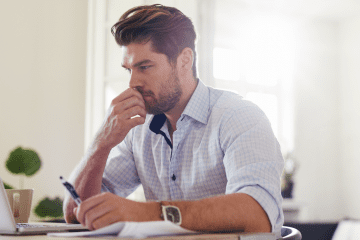 Image of a man doing online training at home for post providing a comprehensive MSPA certification guide.