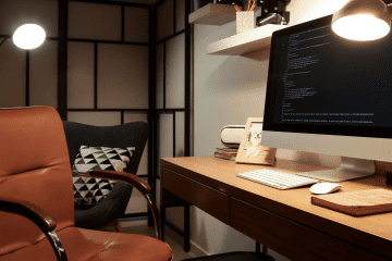 Image of a computer sitting on a desk in a home for a blog post covering the mystery shopping home office deduction.