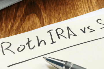 Image of a piece of paper on a desk with the words "Roth IRA vs. SEP IRA" for a post covering mystery shopping SEP IRA vs. a Roth IRA.