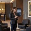 Image of a mystery shopper reviewing notes at a professional conference venue for the June 2026 Mystery Shopping Insider newsletter.